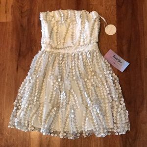 Ivory and metallic party dress